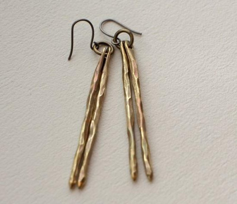 Brass pierced pine needle