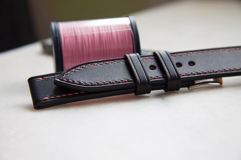 Black leather watch strap with pink stitching
